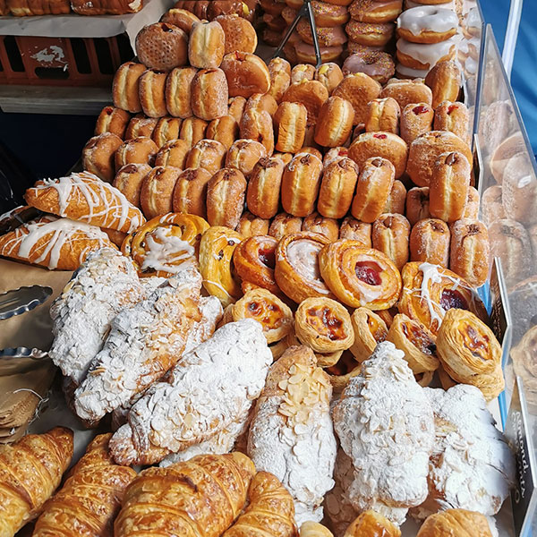 Selection of delicious pastries at market